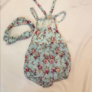 Baby girl spring onesiewith bendable headband.